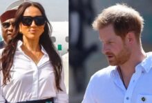 Prince Harry walking away from Meghan Markle