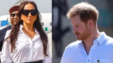 Prince Harry walking away from Meghan Markle