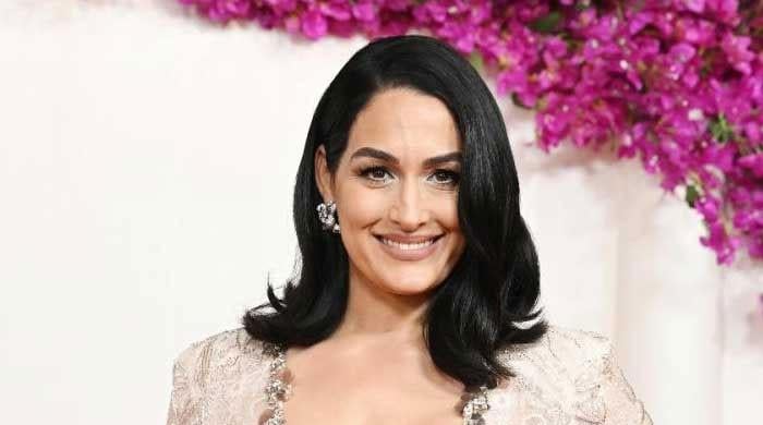 Nikki Garcia Breaks Down Following Painful Divorce from Artem Chigvintsev